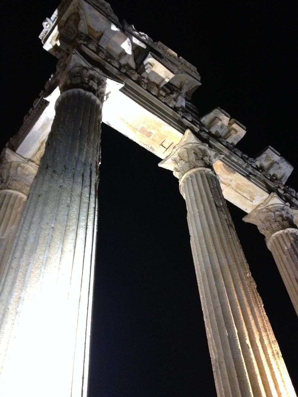 architecture, built structure, building exterior, low angle view, night, clear sky, old, outdoors, no people, history, building, connection, city, tilt, copy space, bridge - man made structure, part of, close-up, illuminated