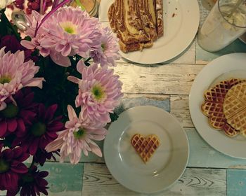 High angle view of flowers in vase on table