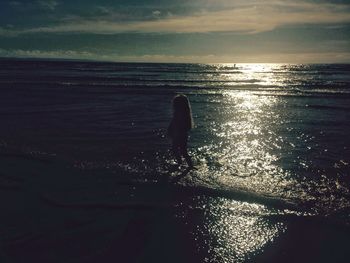 Scenic view of sea at sunset