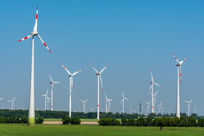Wind power generators in a wide open landscape in germany