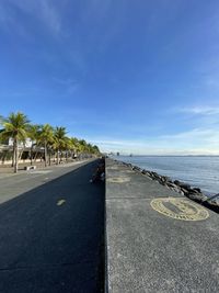 Scenic view of sea side bay walk at moa pasay city