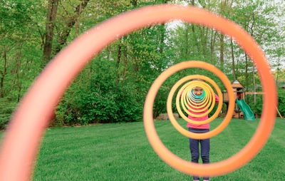 Low section of woman standing in park