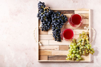 Directly above shot of grapes in glass on table