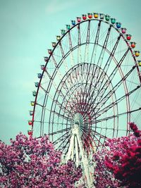 Low angle view of ferris wheel against sky ferris wheel