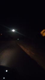 View of illuminated street light at night