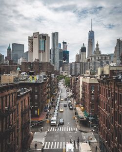 City street against cloudy sky