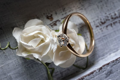 High angle view of wedding rings on table