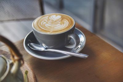 Close-up of cappuccino on table