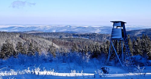 Scenic view of landscape against blue sky