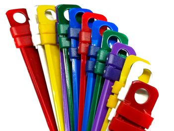 Close-up of colored pencils against white background