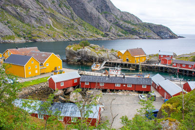 High angle view of townscape by sea