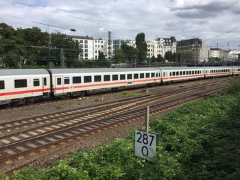 Train on railroad track against sky