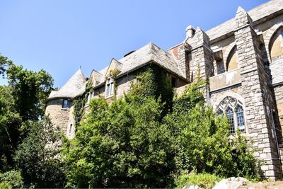 Low angle view of historic building against clear sky