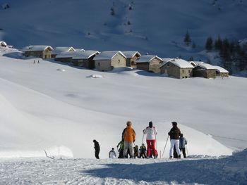 People on snow covered mountain