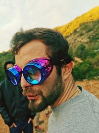 Portrait of young man wearing sunglasses