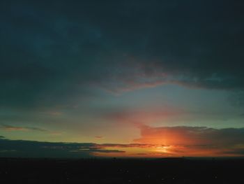 Scenic view of dramatic sky during sunset