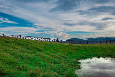 Mountain top view with bright sky and its reflection on water at morning from different angle