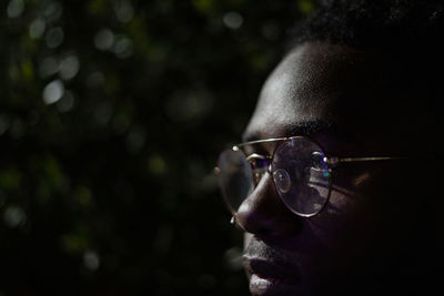 Close-up portrait of man wearing sunglasses