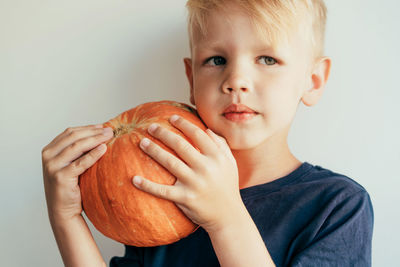 Portrait of boy holding ice cream