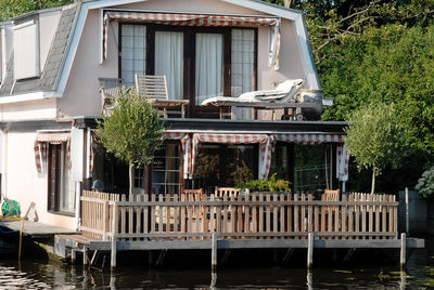 Building by lake in city