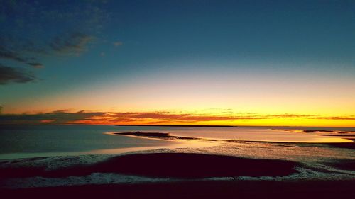 Scenic view of sea at dusk