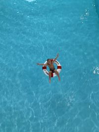 High angle view of person swimming in pool