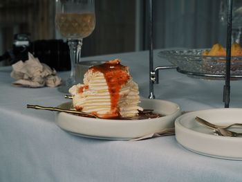 Ice cream in plate on table