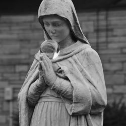 Close-up of young woman standing outdoors