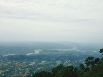 High angle view of landscape with mountain range in background
