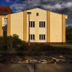 View of building against cloudy sky