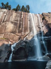 Low angle view of waterfall