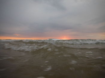 Scenic view of sea at sunset