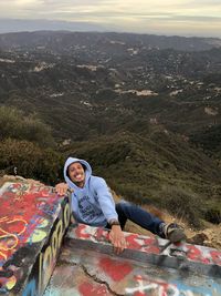 Portrait of woman against mountain