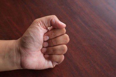 Close-up of hand holding hands