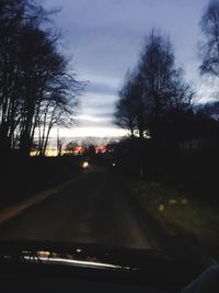 Cars on road seen through car windshield