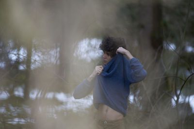 Woman standing in water