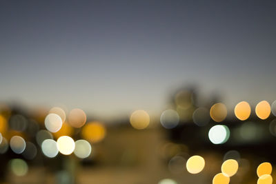 Defocused image of illuminated city