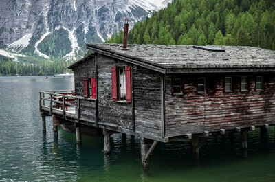 View of cottage by lake