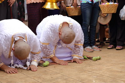 Monks praying during ordination ceremony