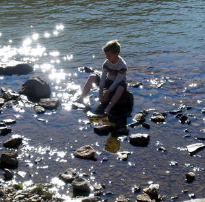 Woman standing on rocks