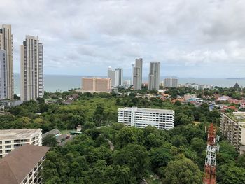 Buildings in city against sky