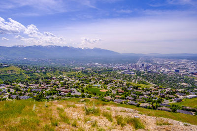 Aerial view of townscape against sky