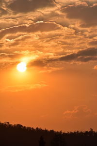 Scenic view of dramatic sky during sunset