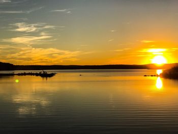 View of calm sea at sunset