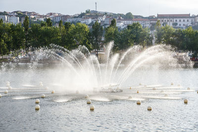 View of fountain on lake