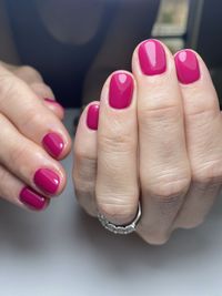 Close-up of woman hand with pink hands