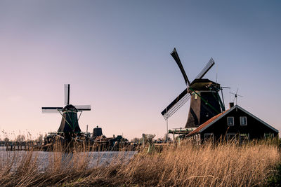 Traditional windmill against clear sky