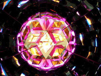 Full frame shot of illuminated lighting equipment at night