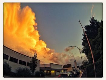 Low angle view of built structure at sunset