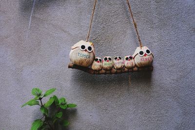 Close-up of toy on wall